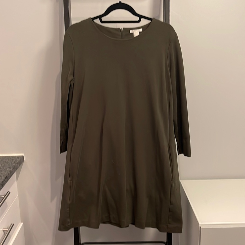 Dark green, long sleeve, polyester dress with pockets, above the knee length